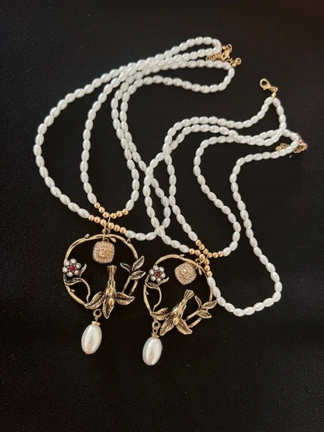 double bird necklaces.jpg