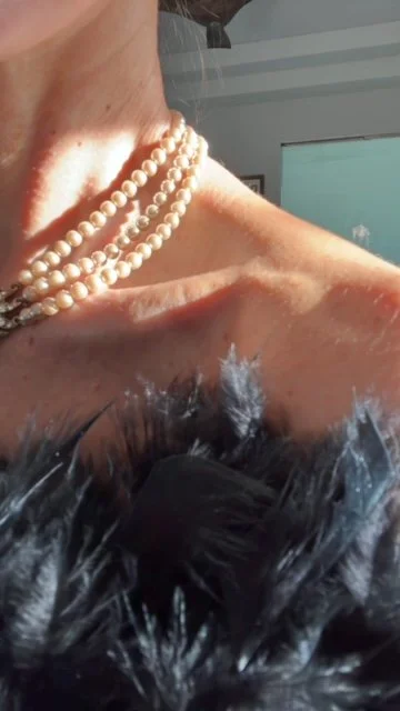 rhinestone center on feathers.JPG