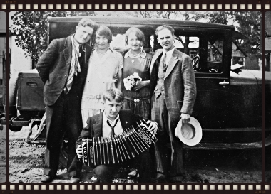The name "30's Playtime" brings to mind the carefree hours of youth from a long ago era, as imaged by this charming 'gang' . All of them ready to load into the jalopy and head off to the rural youth dance down a dirt road yonder. That's my grandmother holding the bouquet. She, a farmer's daughter, likely had few leisure hours to herself. This would've been a special day for her to enjoy. She sewed most of her own clothes , probably this lovely dance dress too. It was she and my mother that first taught me to sew, which I loved from the the very first stitch! Now I'm happy to be able have this vintage inspired collection of 1930' prints in our quilt shop. I can hardly wait to pick out a quilt pattern and get stitching!