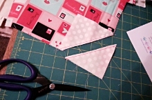 Then, cut between the 2 rows of stitching to trim away that unused corner. 