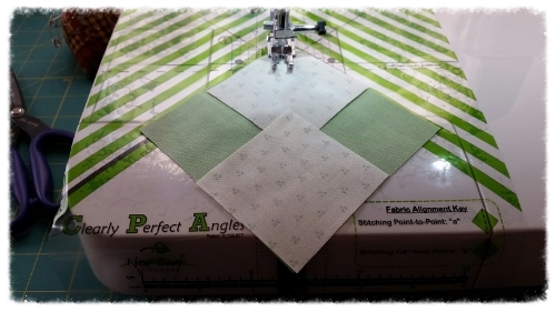 Place 2 small squares as shown and Stitch.......