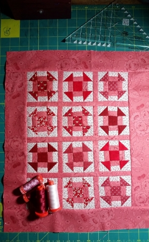 Add the 2 1/2" border strips to the top and bottom. Press to the border. Layer, quilt, bind and then LOVE your quilt♥