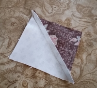 ON THE BACK OF YOUR PIECE THE SEAM ALLOWANCE IS NOW PRESSED TOWARDS THE DARKER FABRIC ☺