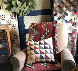 Photos courtesy of Kansas Troubles/ Moda Fabrics and Supplies Designer Lynne Hagemeier made her 18” block into a pillow.