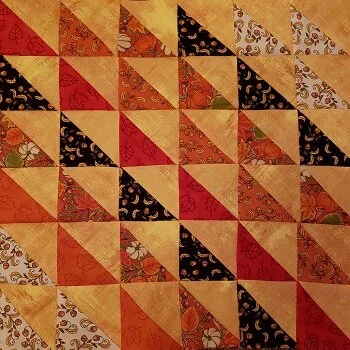 Make 36 HST. Arrange in rows and stitch together using 1/4” seam allowance. Block should measure 18 1/2”. (18” finished size)
