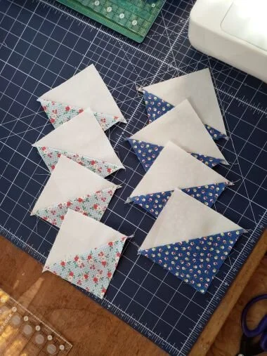 You will get EIGHT BONUS HSTs from every 18” Harper’s Garden block you make , if you add that second row of stitching to the flying geese units before cutting off the corner triangles. You can use these to make extra blocks or even a bonus quilt if you are making multiple Harper’s Garden block.