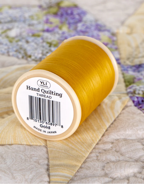 GOLD 007 on plastic spool.png