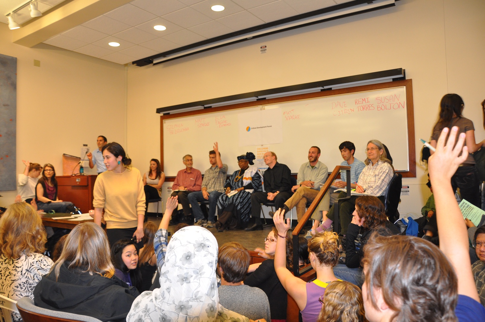 Photo by Tom Paulson of our May 2011 panel, "Can You Save the World?" (a tongue-in-cheek title) which drew over 250 students into a tiny room to debate their role in global development and global justice efforts