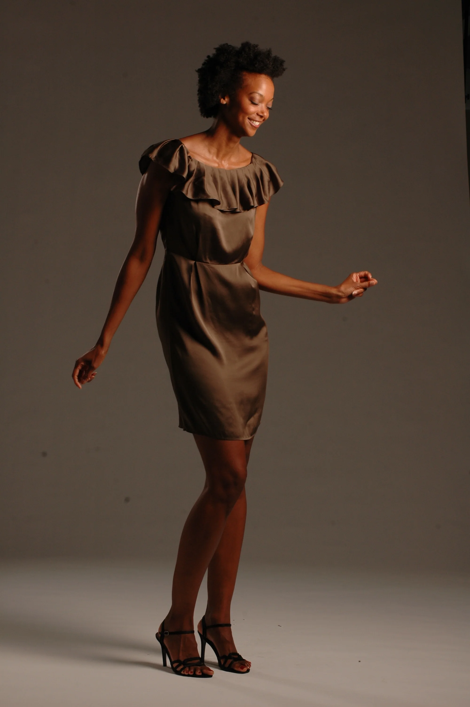 Dancing at a modeling shoot.