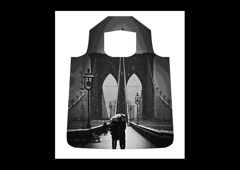 Brooklyn Bridge Shopper's Tote . Photo of a couple on the Brooklyn Bridge in the snow.