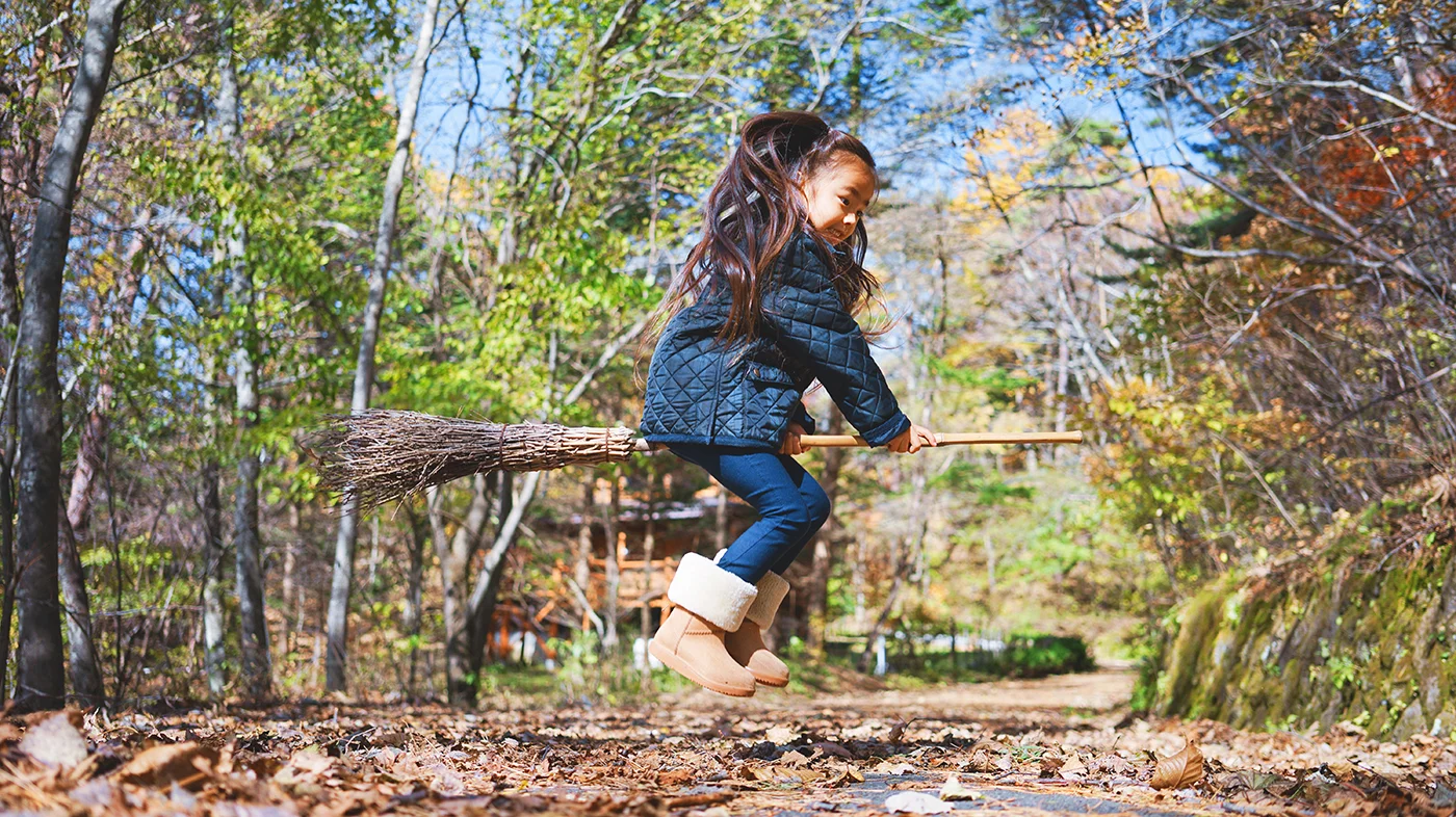 girl-broomstick-play.jpg
