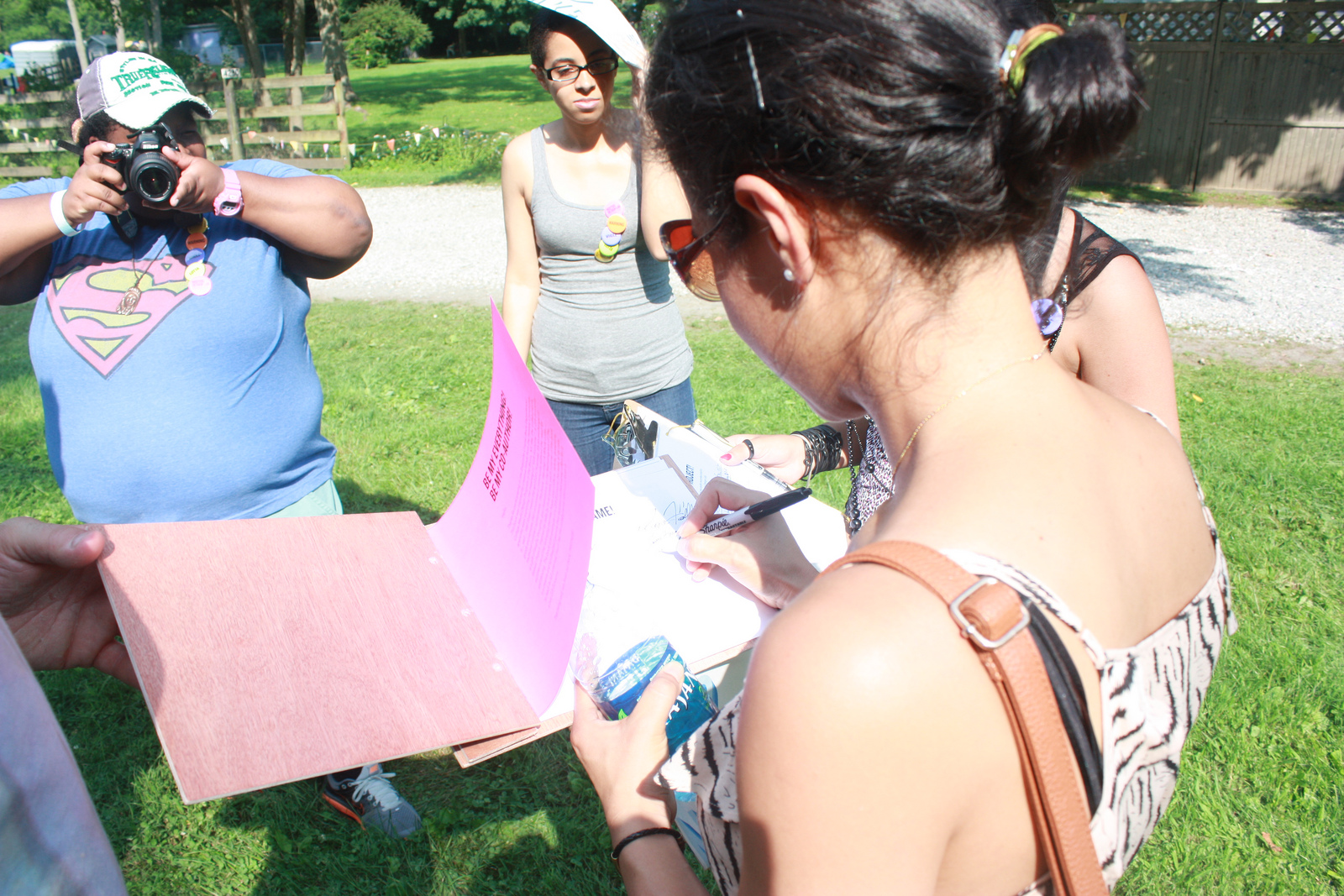 Festival attendees participate in community book project