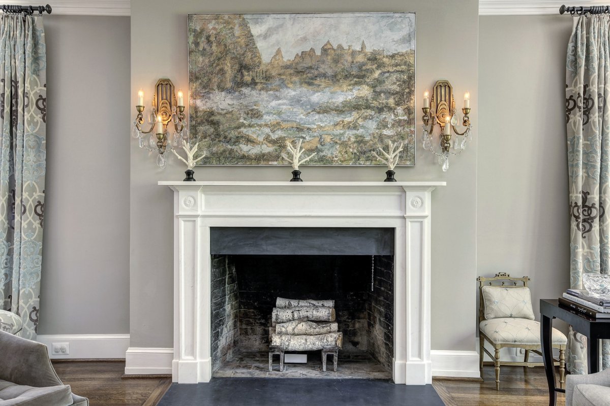 the-fireplace-and-mantel-lend-the-home-a-rustic-charm.jpg