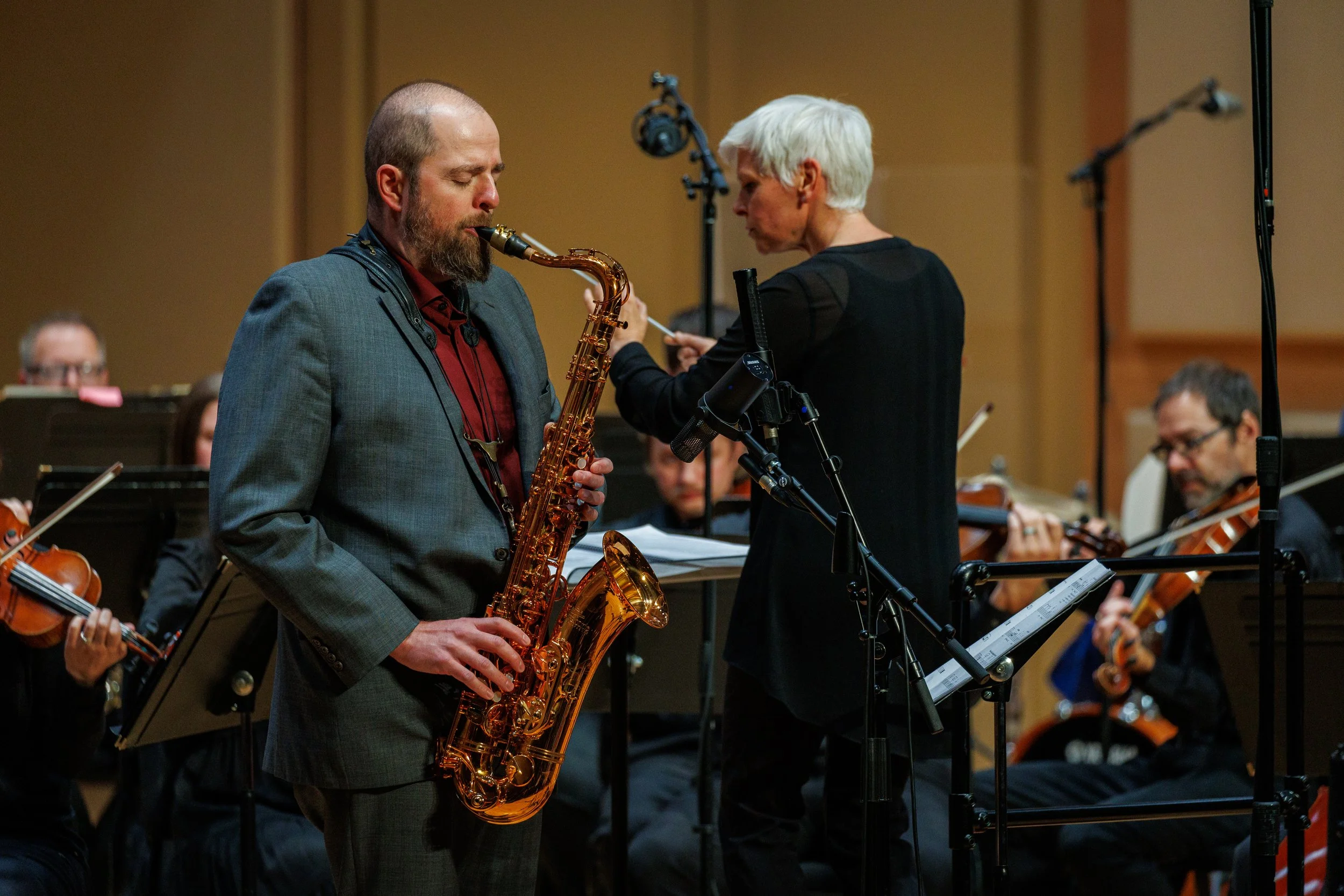 Tenor Saxophonist Jon Armstrong performing "Voluntary Breath" with orchestra