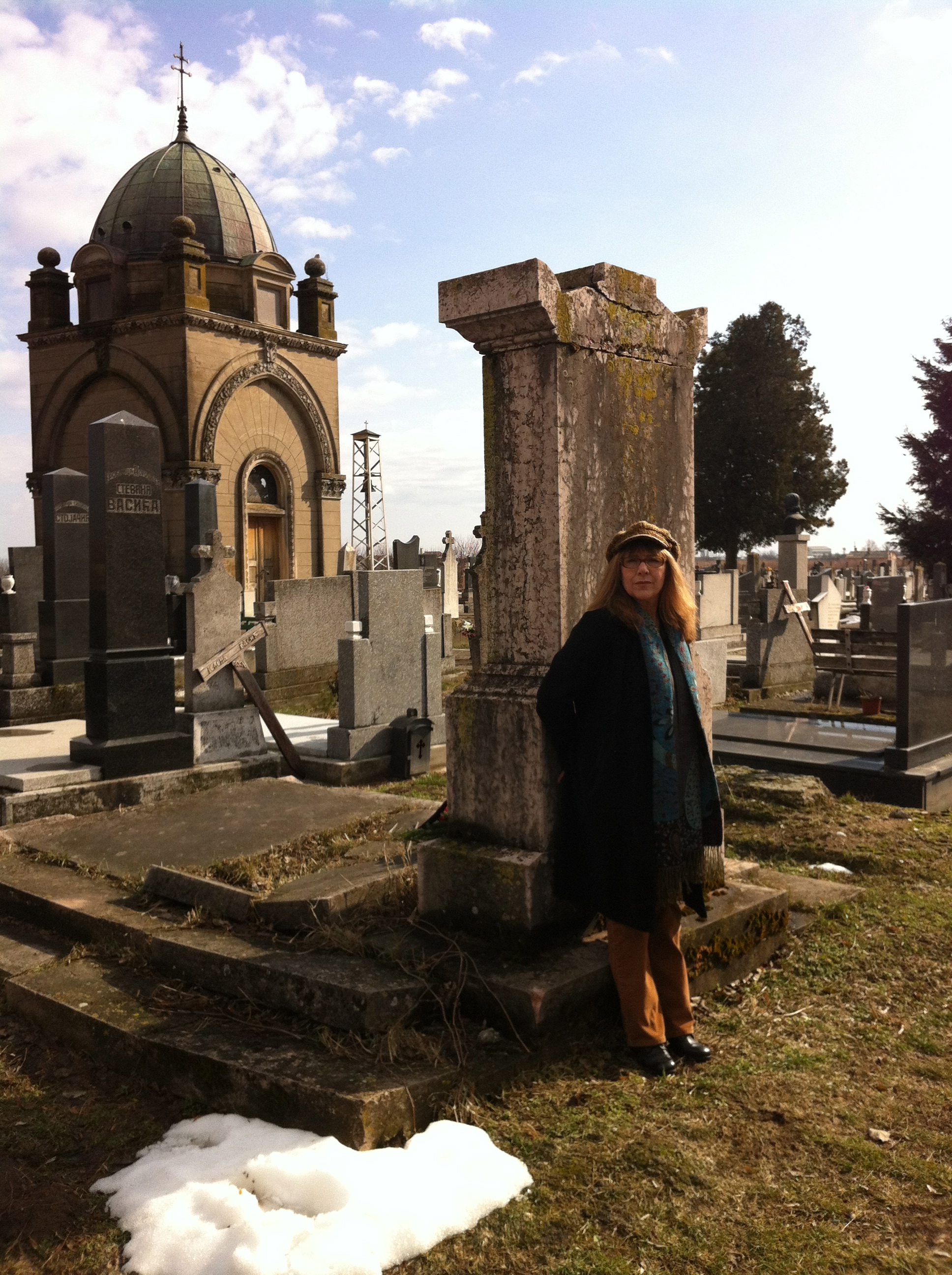 Anna at the grave of her Great-Grandfather Petar Bogdanović