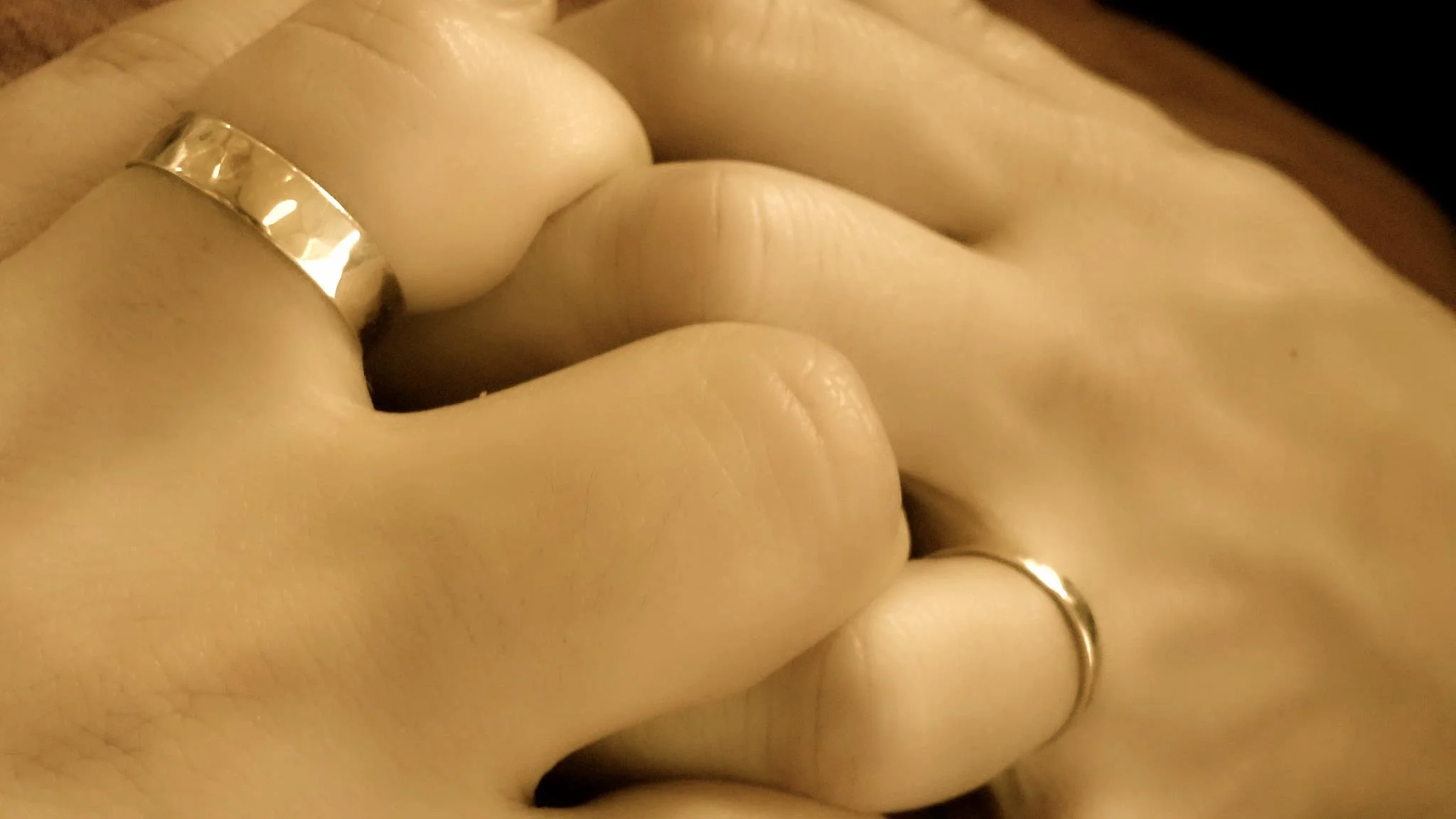 Leon and violet's wedding bands - his: 14K yellow gold, hers 18K, hand-hammered texture