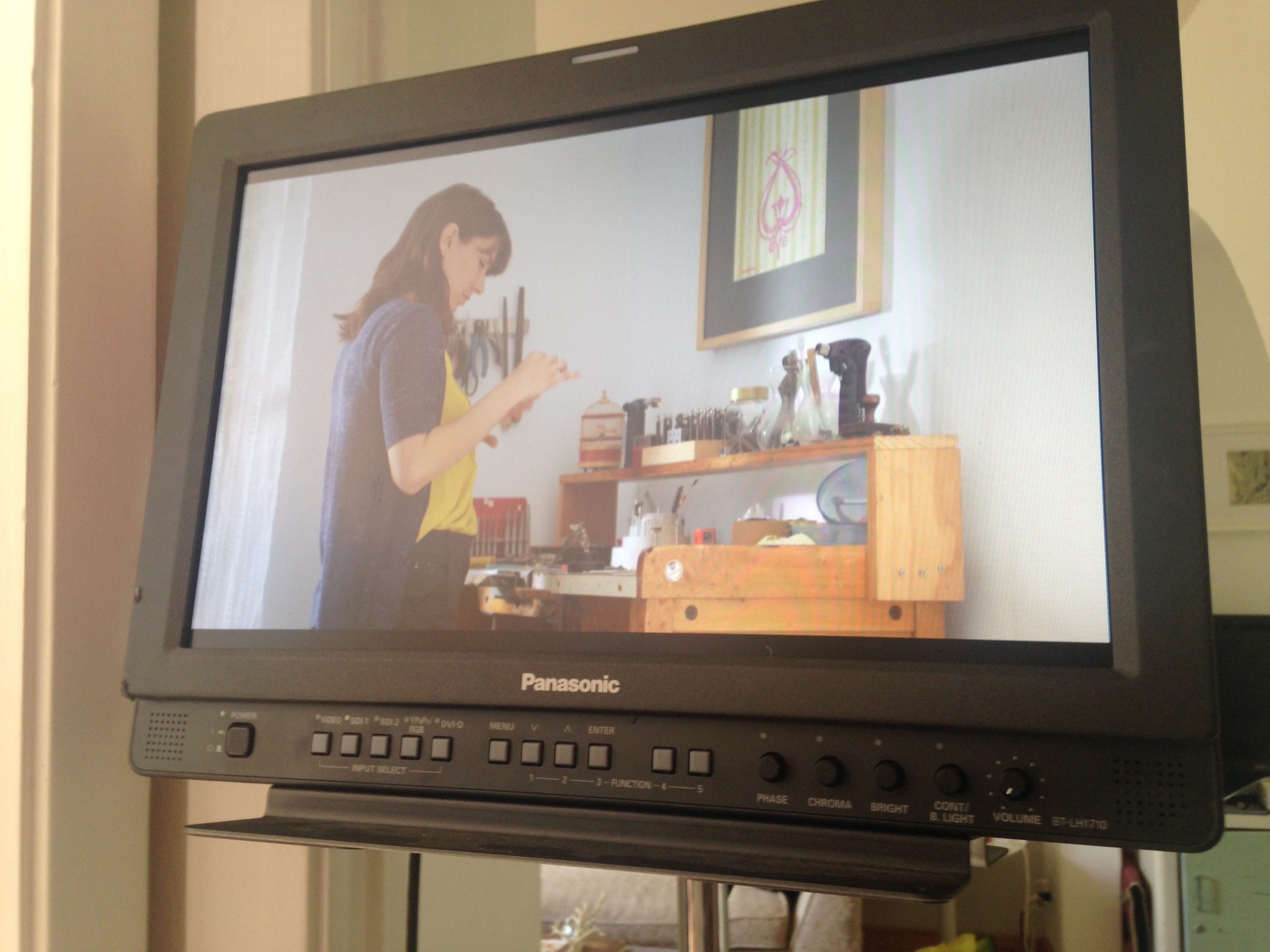 monitor shows actress teresa working on her jewels 