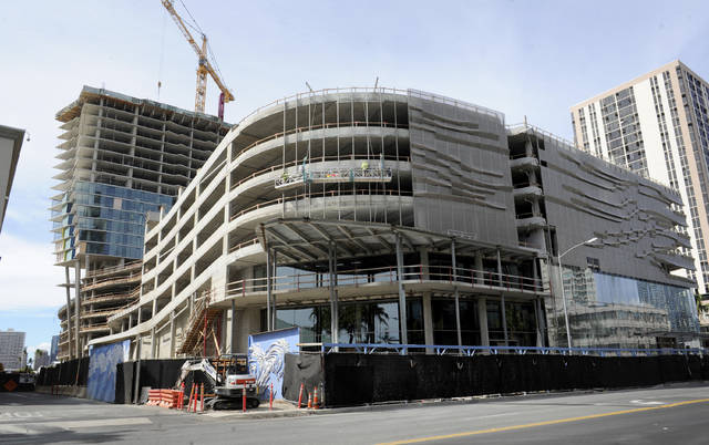 Photo: BRUCE ASATO / BASATO@STARADVERTISER.COM The Ae‘o tower at Queen and Kamakee streets will have a Whole Foods Market on its ground floor. The complex is 32 percent built and slated for completion late next year.