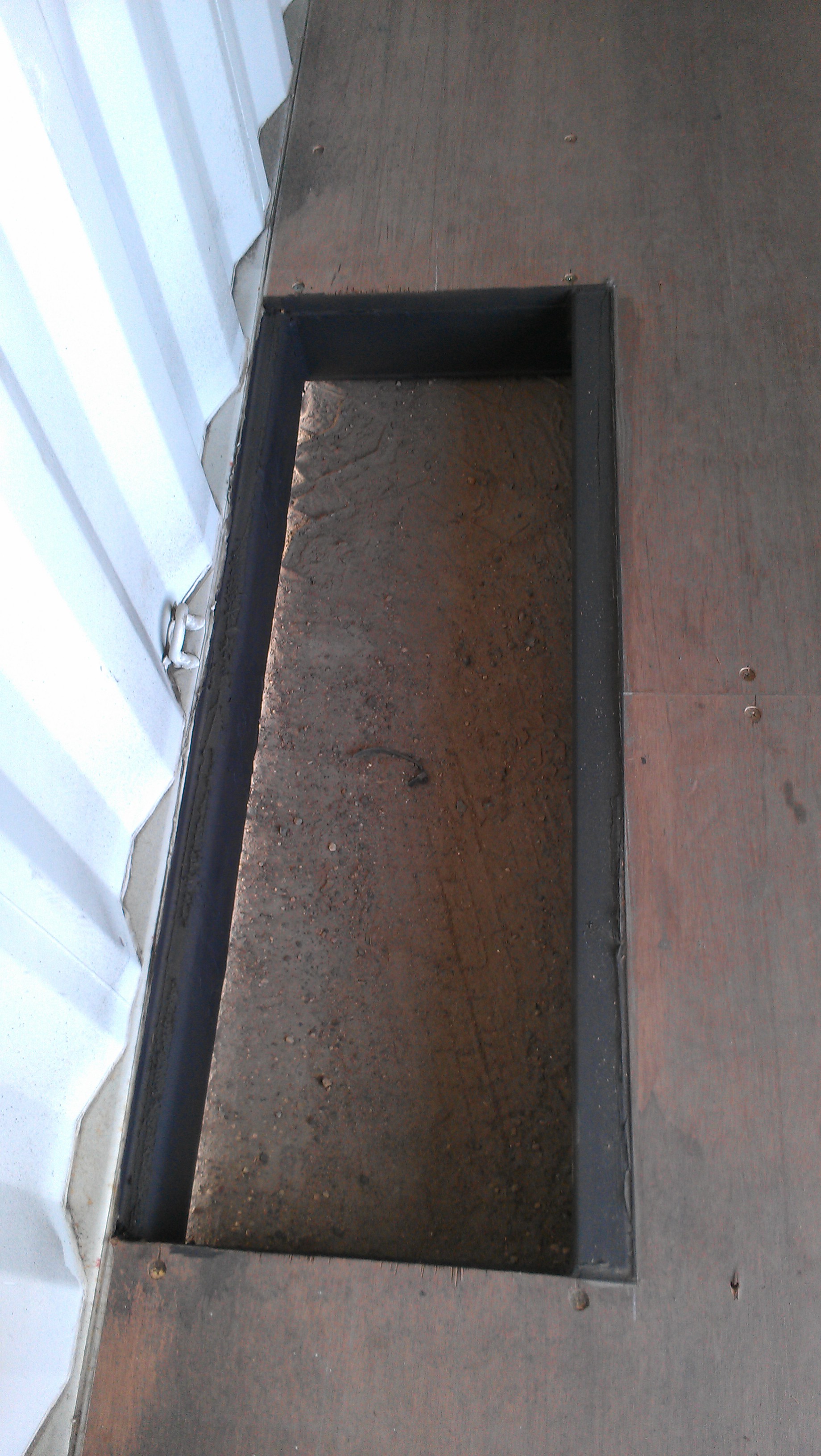 Custom hole in floor of container