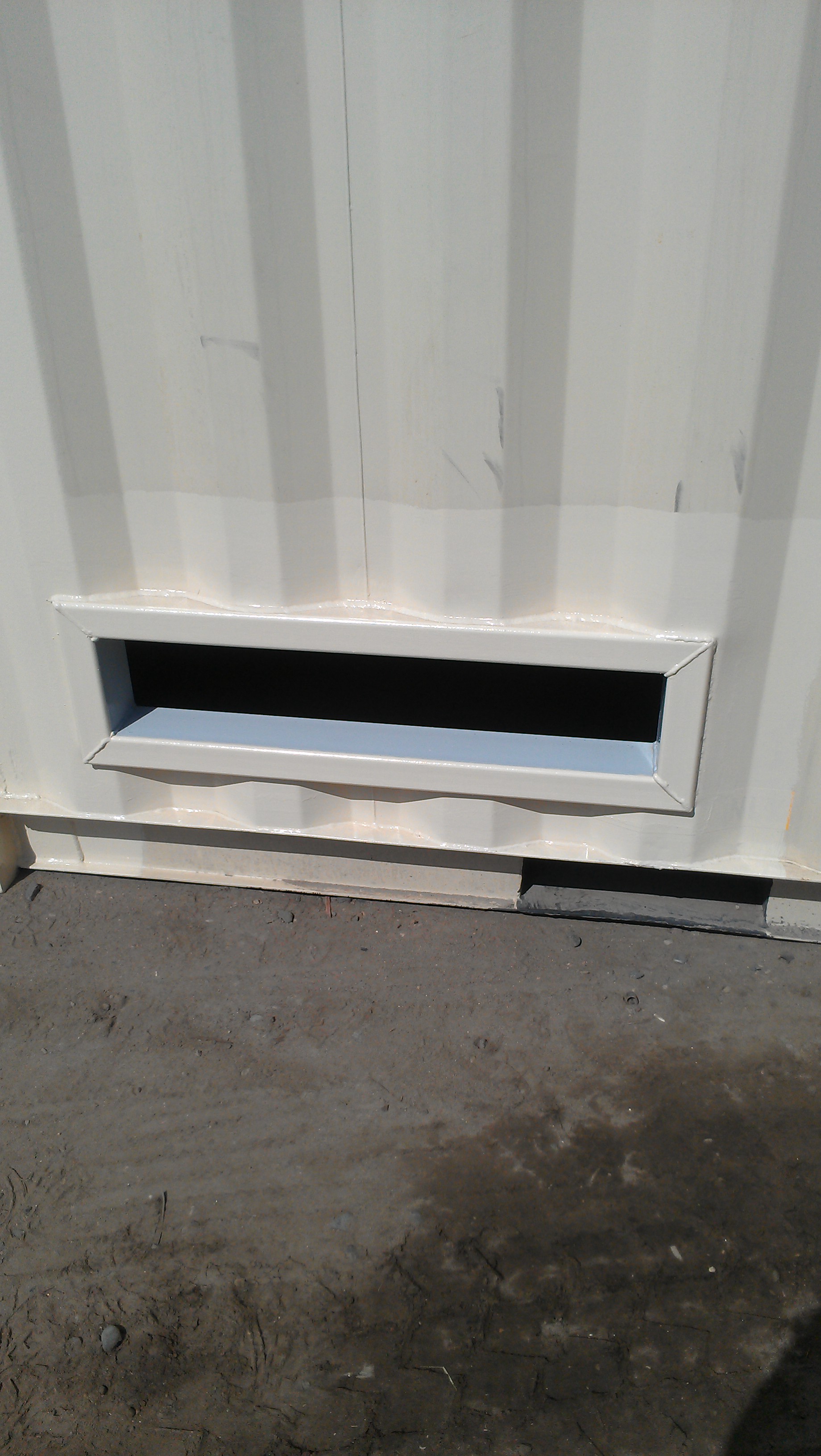 Custom-sized hole in side of conatiner - outside
