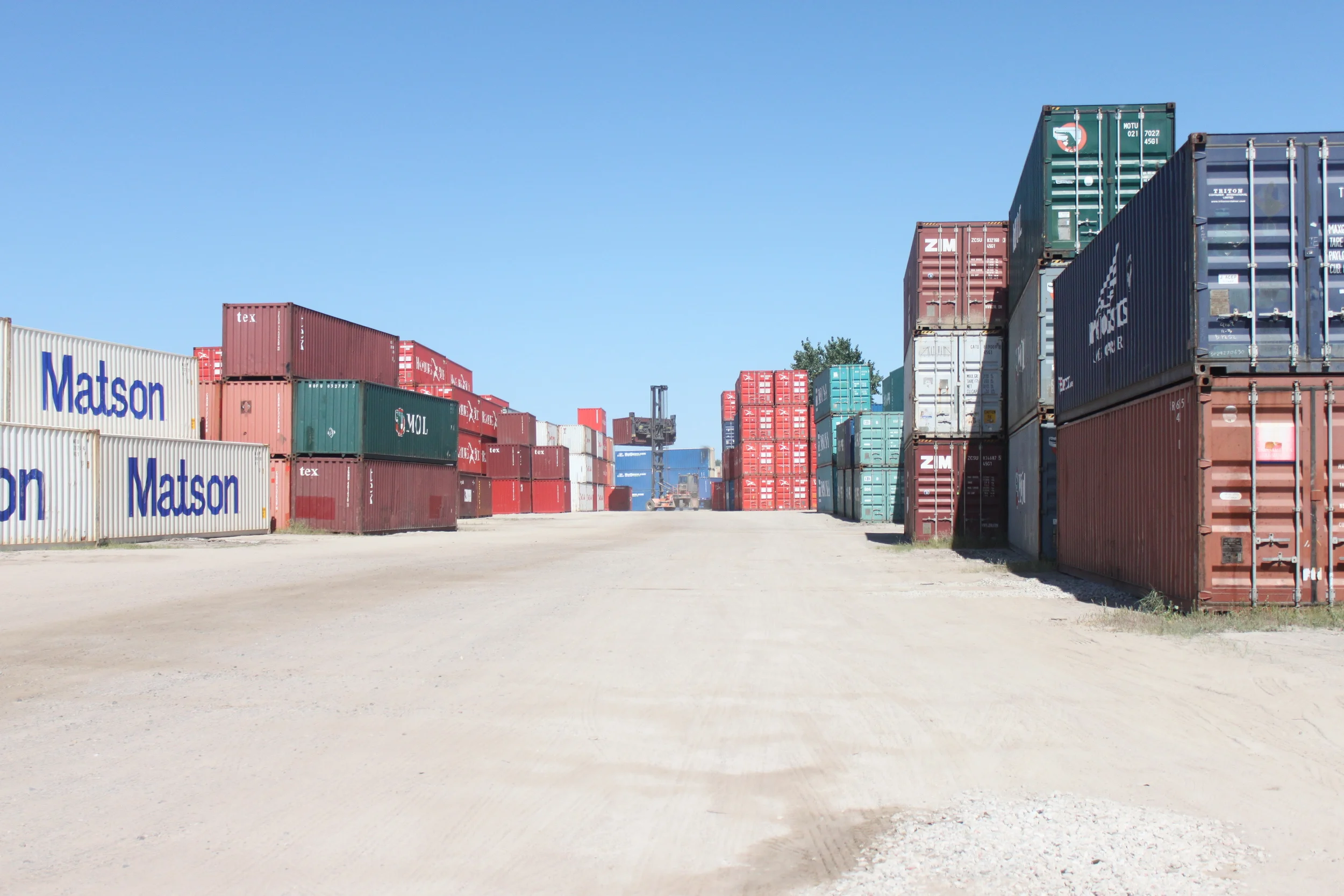 These containers in a container depot are all slated to transport goods to another country