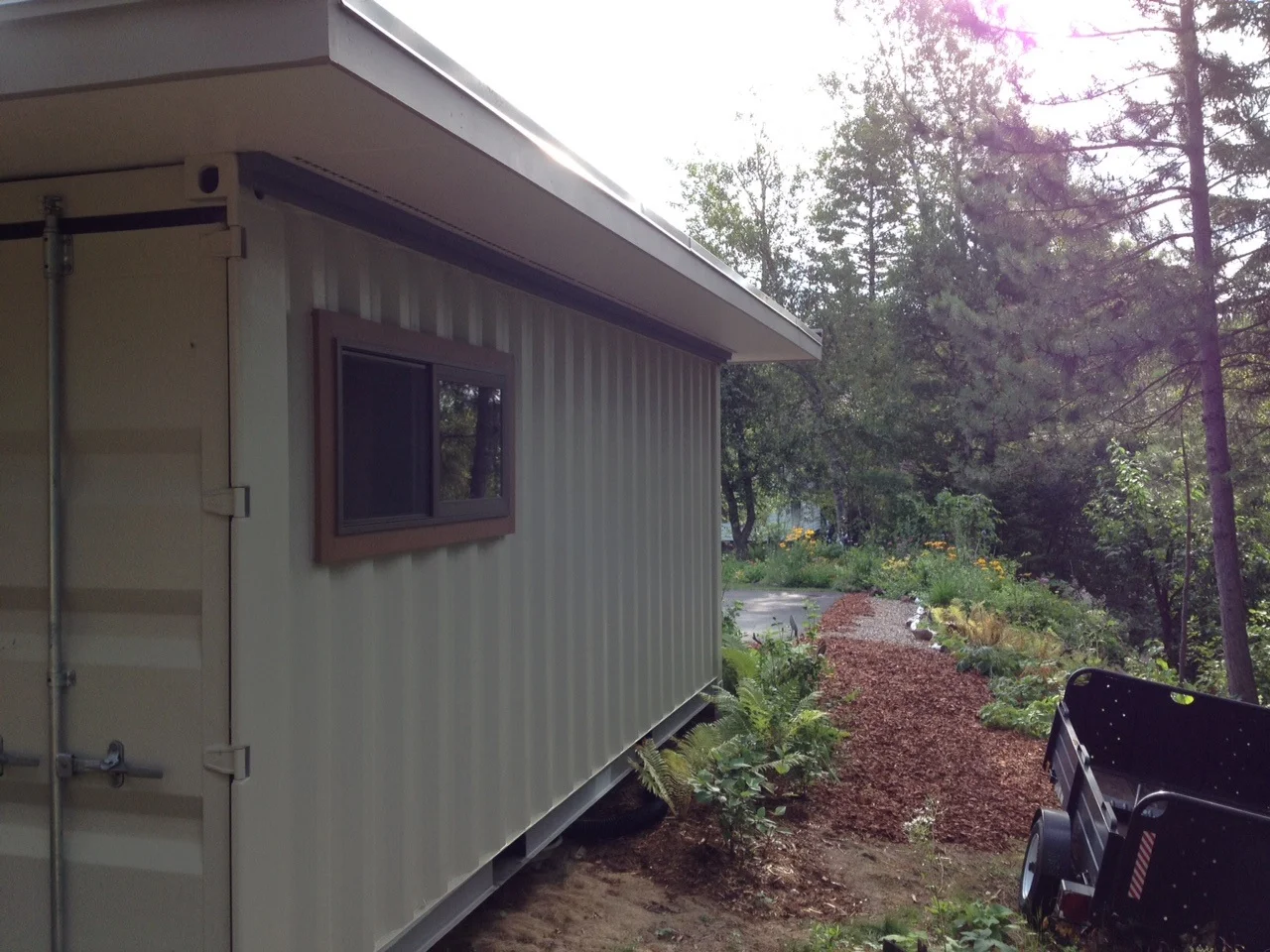 Container shed positioned just perfectly on the property.jpg