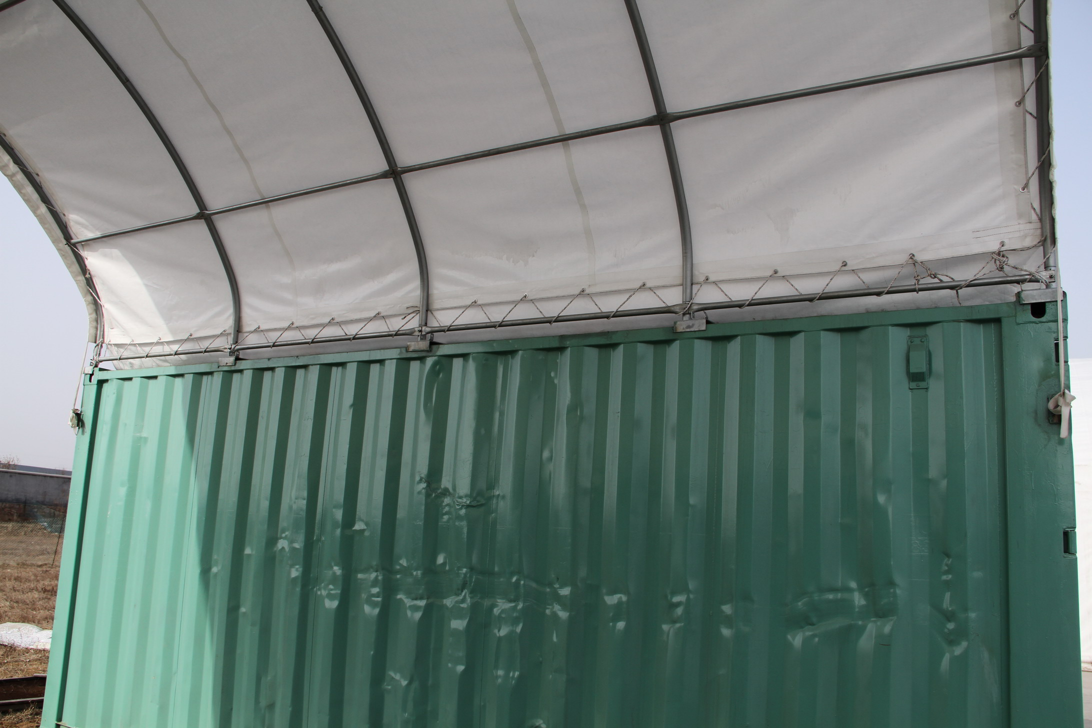 Roof attaches to container.jpg