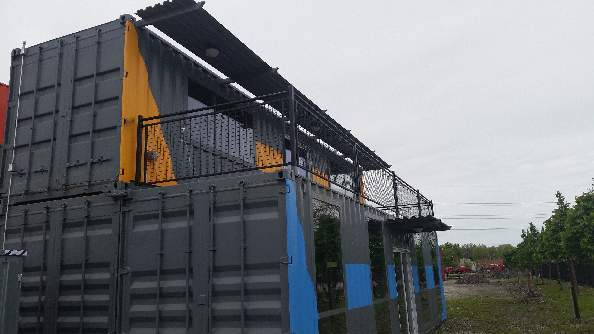 3-container, 2-story building