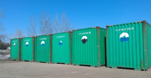 Containers being loaded at customer site