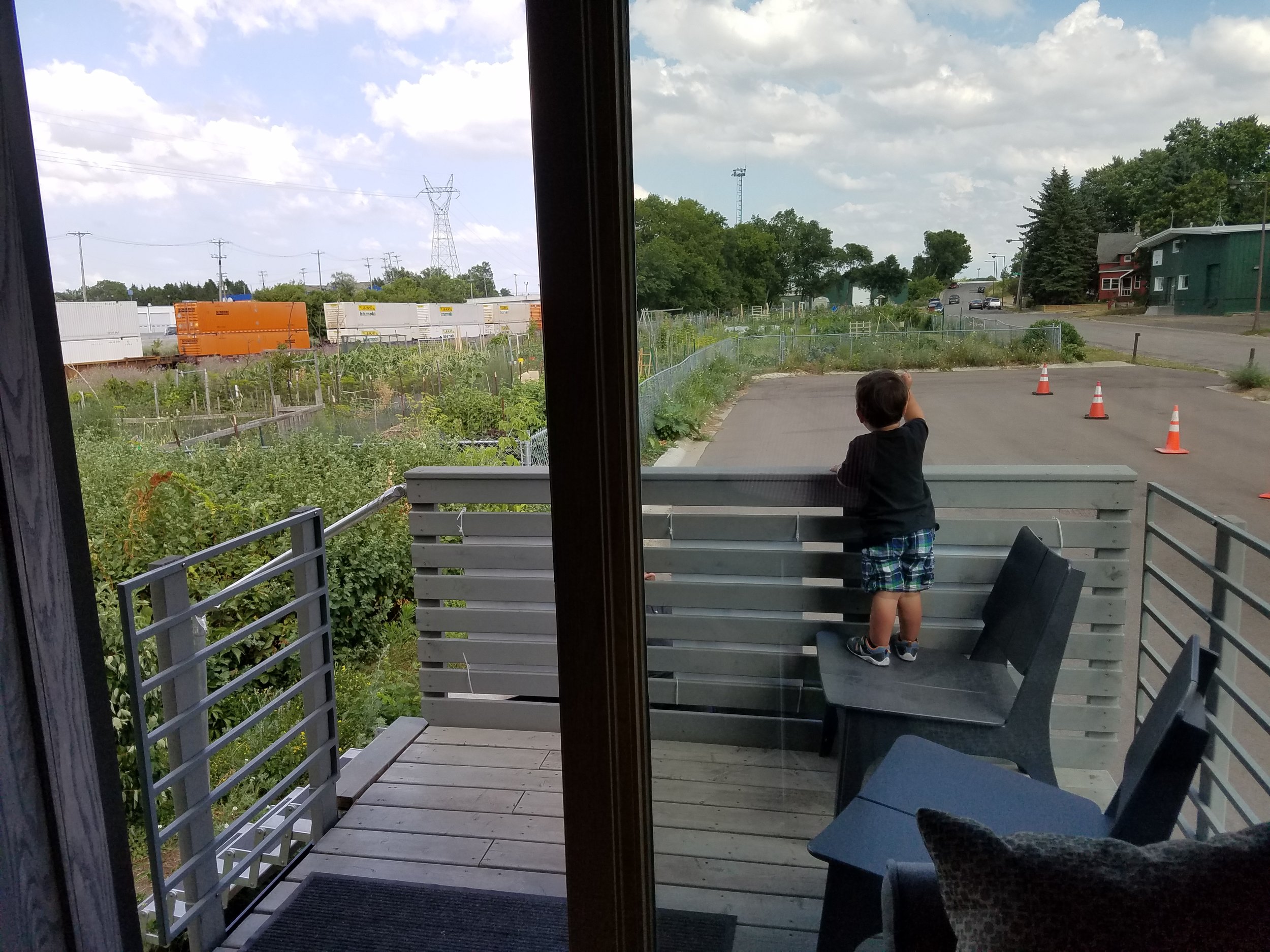 Watching trains from the patio of the hotel room.