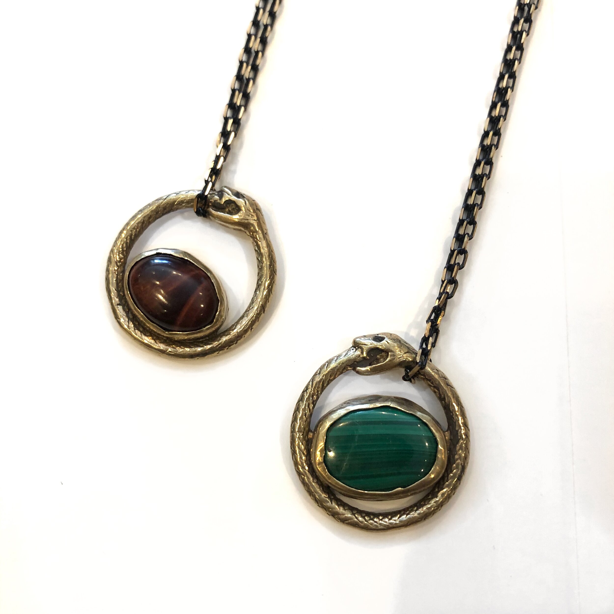 Stone Ourobouros Necklaces