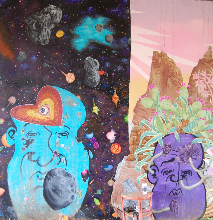These faces were painted by an unknown artist before i painted my murals. I dig them so i kept them in tact, mostly.