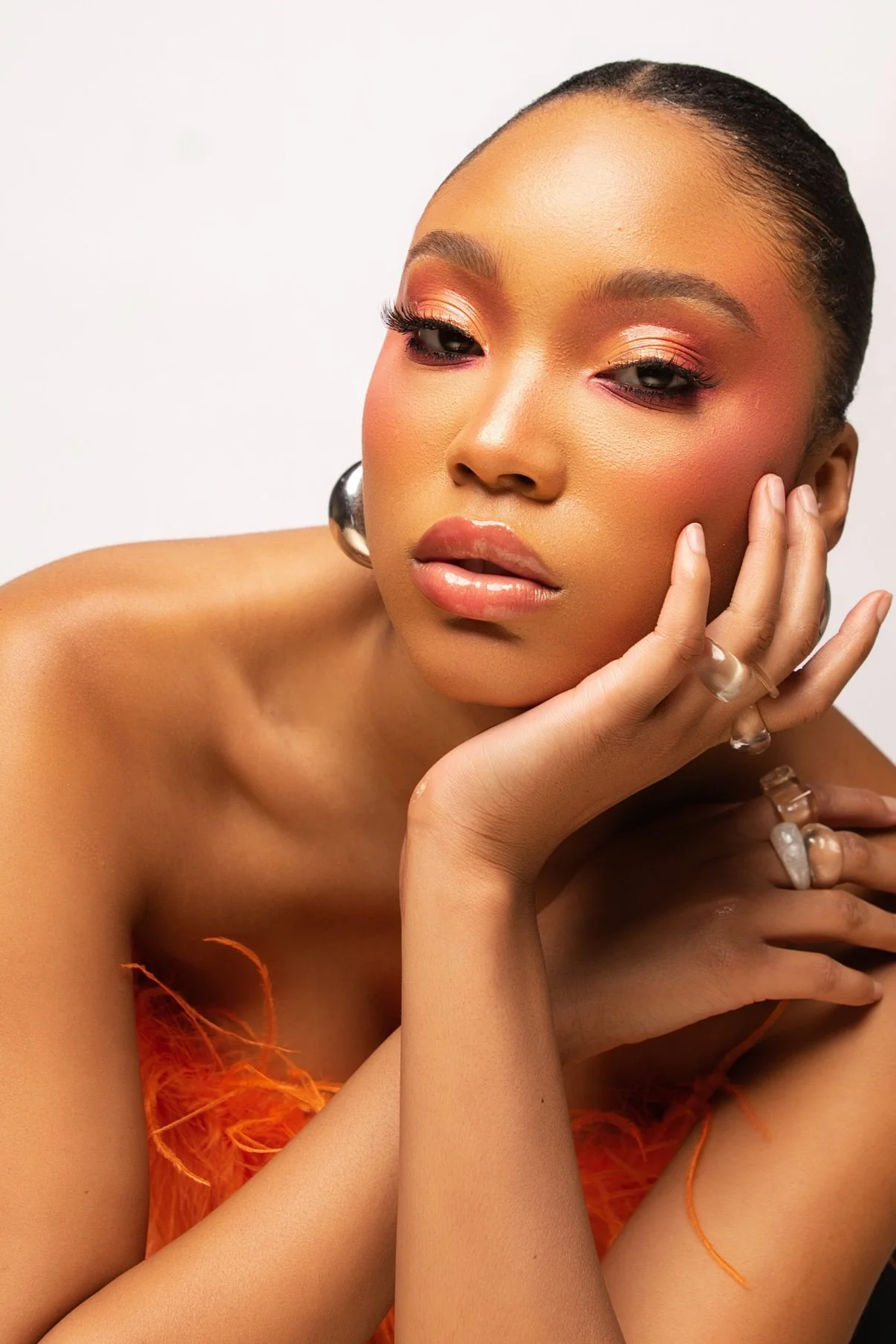 Dramatic warm-toned glam makeup close-up by SoChevon, Atlanta makeup artist