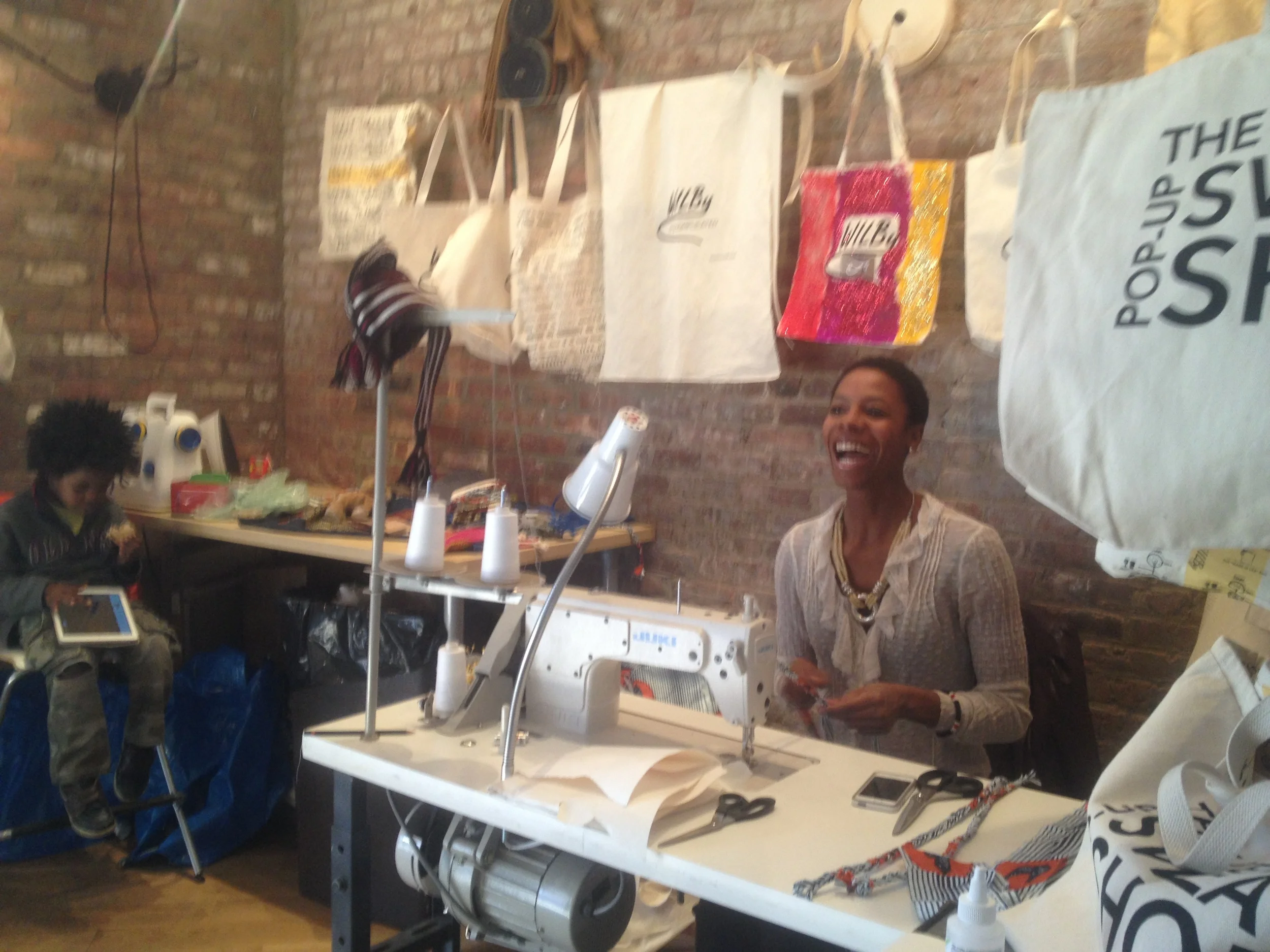Nasozi making aprons in the pop-up sweatshop.