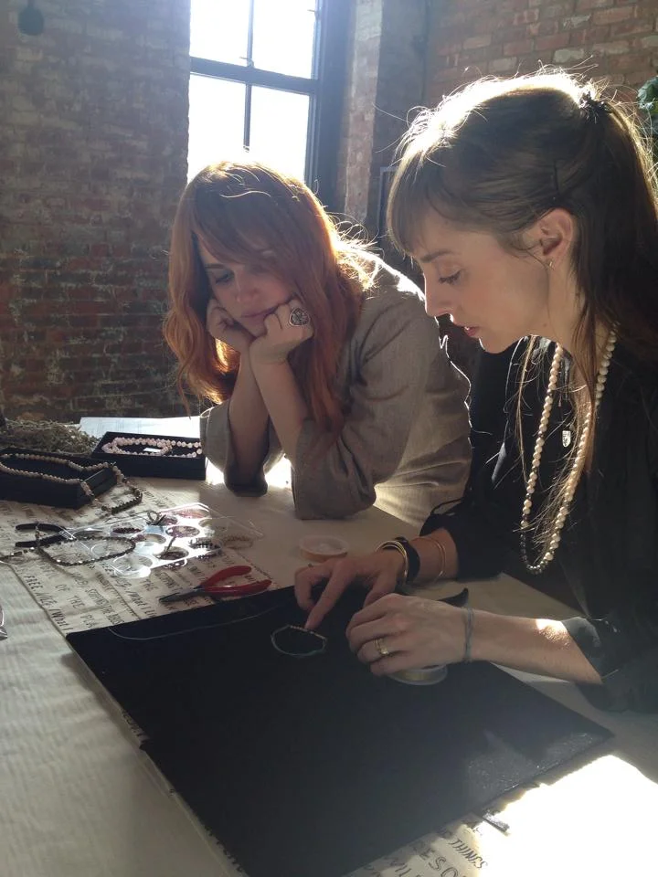 Izaskun teaching Heidi Heyoka how to make a bracelet.&nbsp;