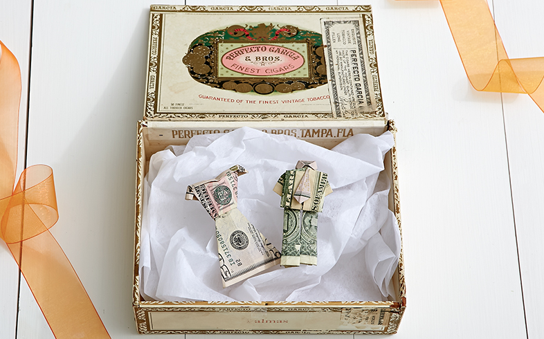 photo courtesy of Berries.com (Wedding DIY: 7 Creative Ways to Gift Cash) 9. WHAT'S AN APPROPRIATE GIFT? I have no idea why, but people don't bring their gifts to the Orthodox weddings I've been to. They either drop them off in advance or after the fact. While some brides register, many don't, which leaves you on your own. Checks are always considered appropriate, often in denominations of "chai" - $18. If the couple is moving to Israel, this is your best bet, so they don't have to shlep anything. Otherwise, household goods, cookbooks, crystal, or Judaica such as kiddush cups. I don't recommend mezuzah covers, although it seems so intuitive, because most of them are too small to contain a kosher scroll.