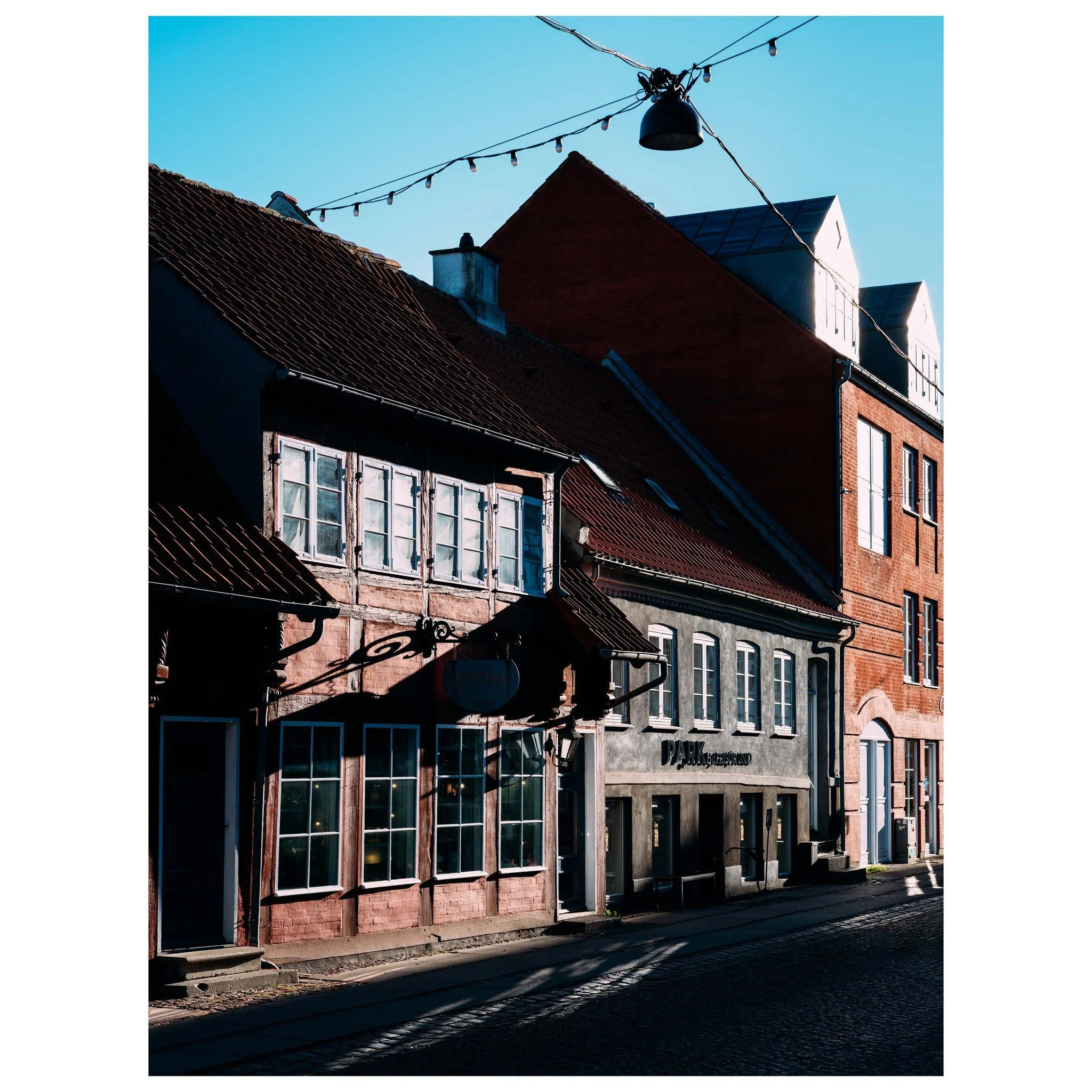 The Shape of Quiet

Between the angles of roofs and the rhythm of cobblestones, stillness finds its voice.

&copy; 2025, CLAUS SALL PHOTOGRAPHY
www.claussall.com
🚫 Not AI generated

Contact me on:
📞 23 90 11 69 
📧 cs@claussall.com

---------------