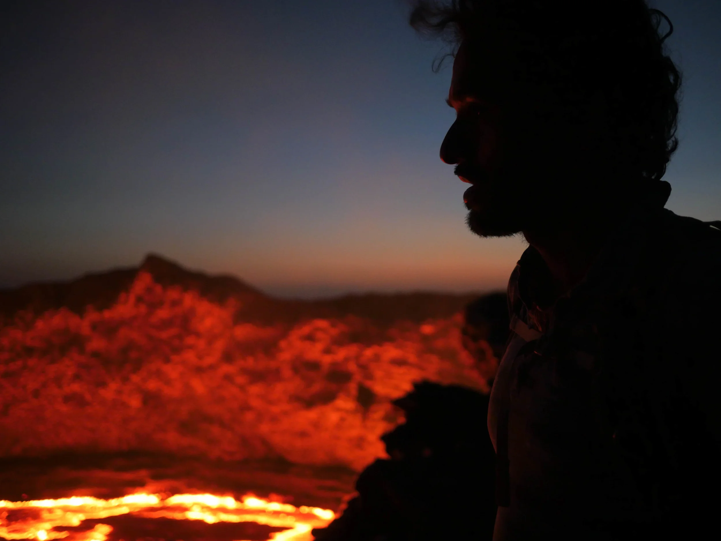 Vijay Shah peering down metres from the edge