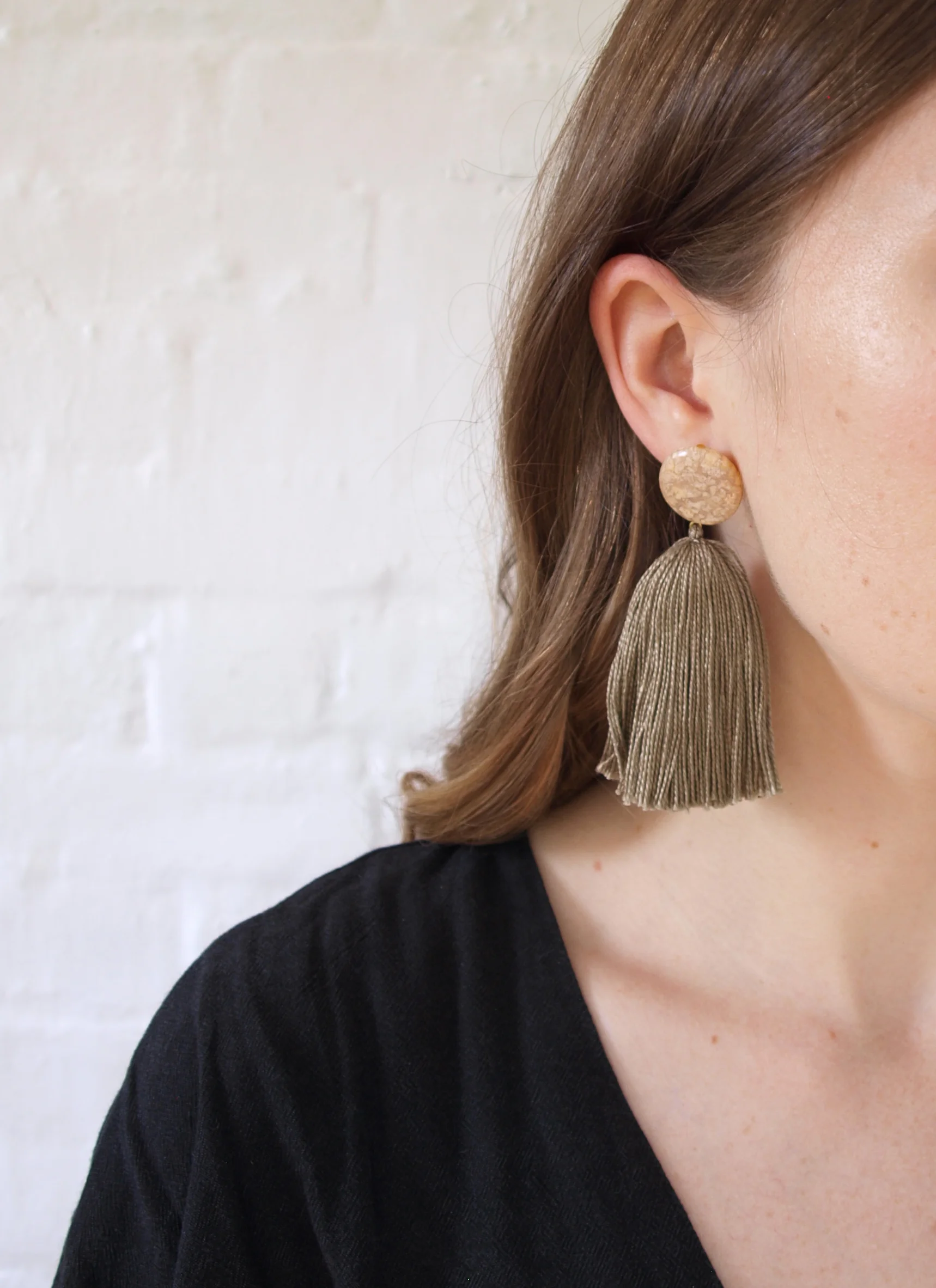 sage tassel earrings model 1 crop.jpg