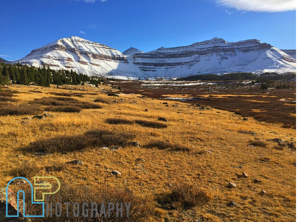 Henry’s Fork Basin with the top of King’s Peak in the background. The ice is in the middle cliff-band halfway up the mountain in the sun. October 24th.