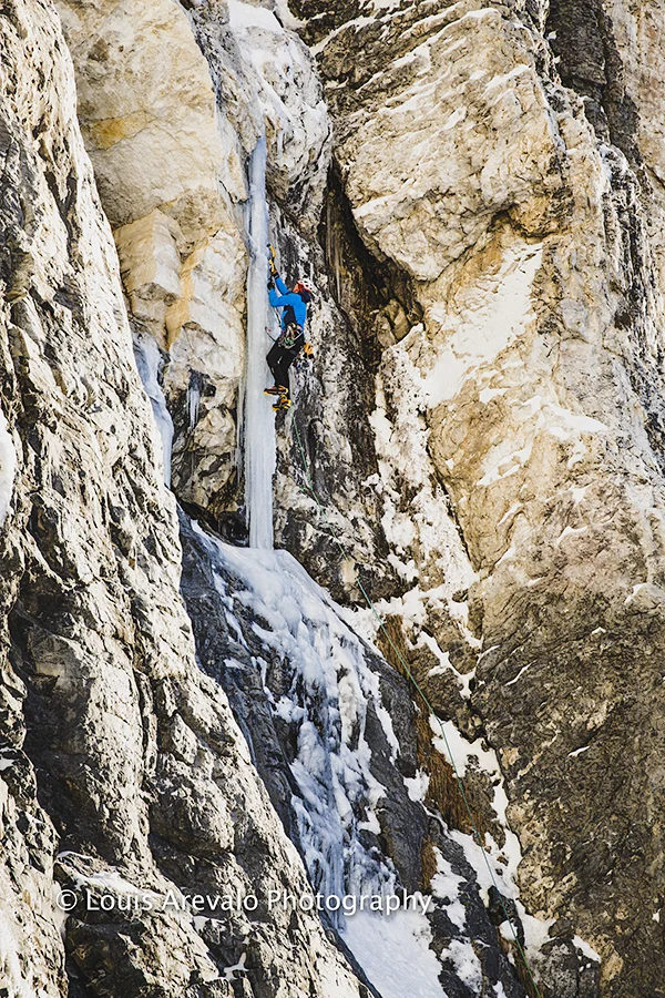 Nikki Smith on the ice pillar during the first ascent of The Bone Collector. Photo ©Louis Arevalo