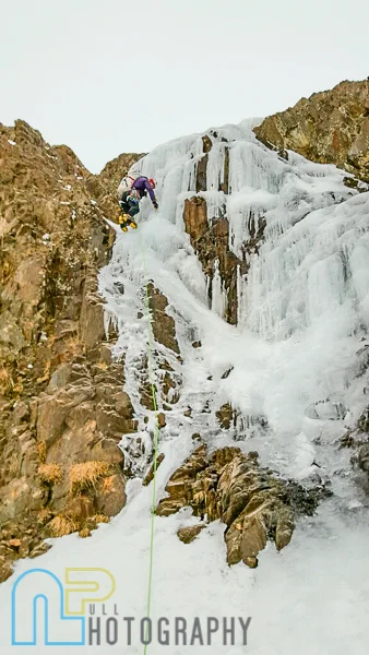 Nikki climbing the first and crux step of ice. Photo © Matt Scullion