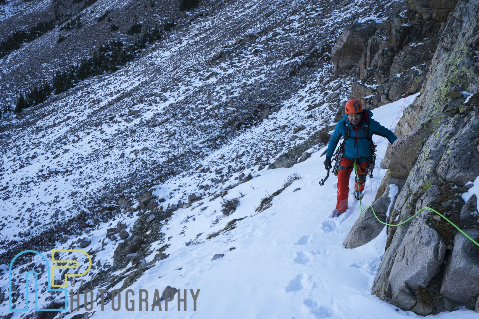 Julien Baudrand on the traverse above the ice on pitch 1.