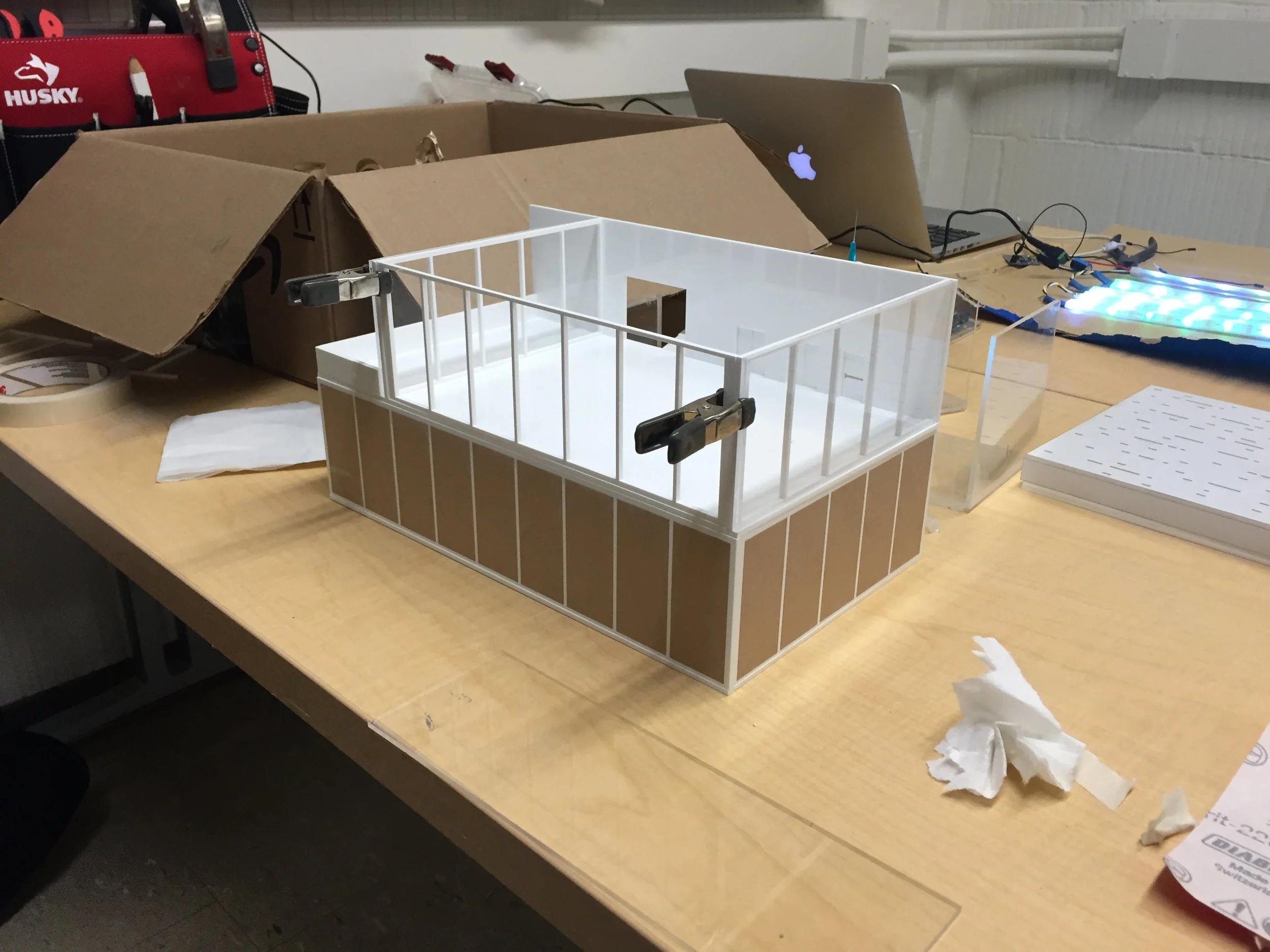 Sheets of acrylic were laser cut, then glued together using a bonding solution. 