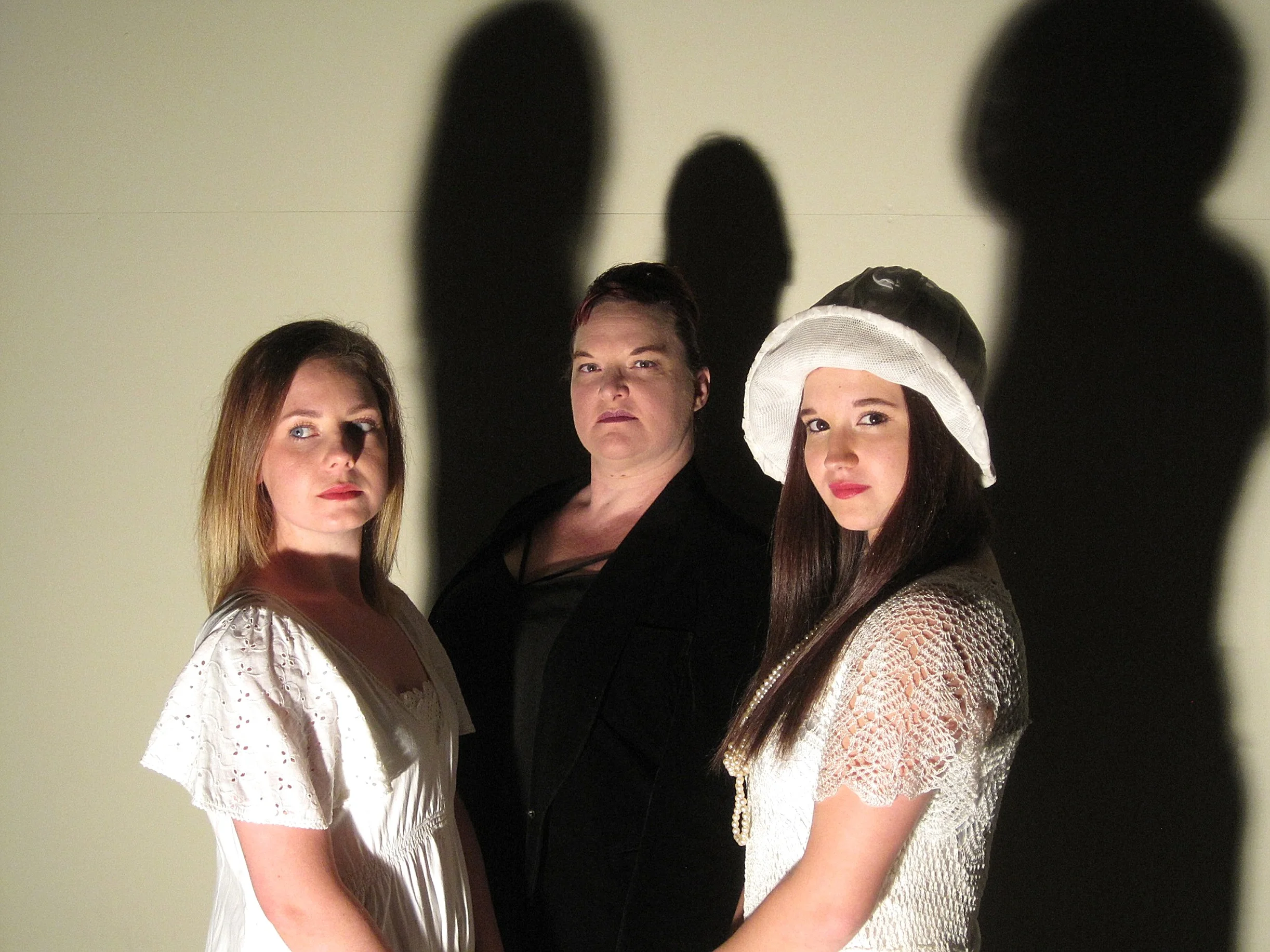 The Cat and the Canary features Samantha Hutchins, left, as Annabelle West, Kristen Twynam-Perkins as Susan Sillsby and Kelsie Anderson as Cicily Young.