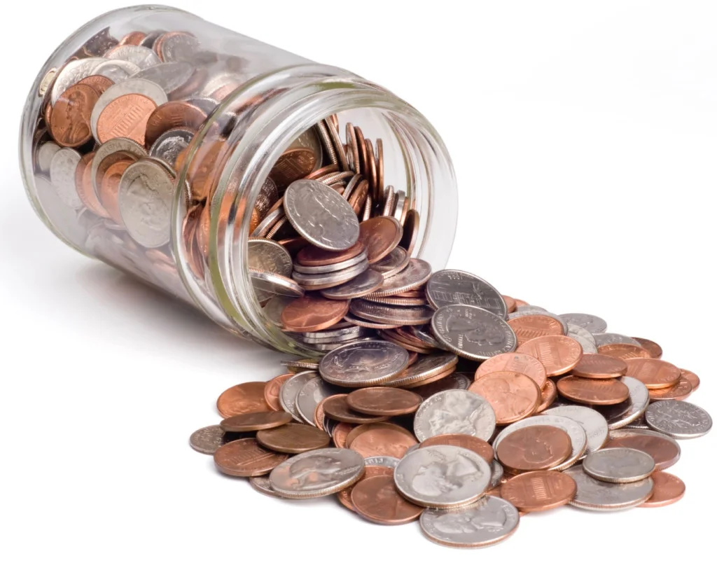 Coins Spilling from a Jar