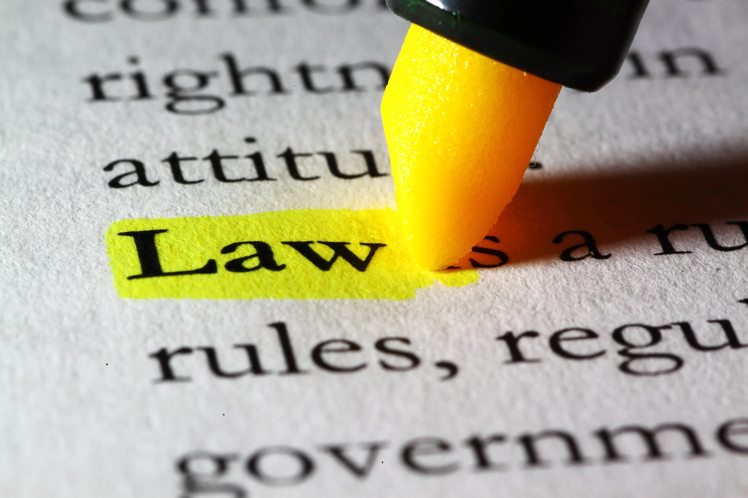 Word law highlighted with a yellow marker