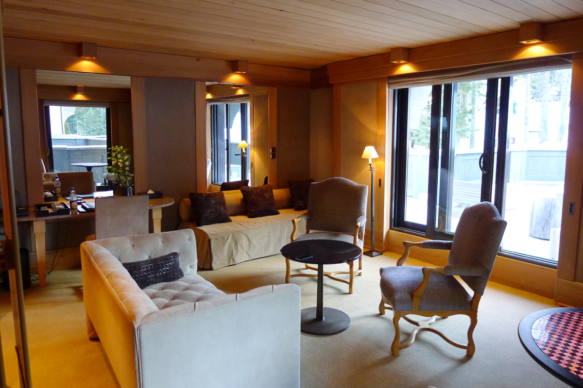 The living area. The view was amazing and the balcony through those glass doors overlook the main ski trail!