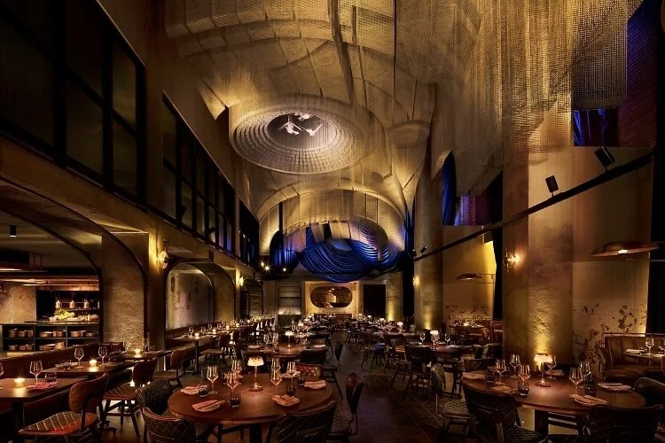 Cathédrale The new Moxy East Village is making major waves, not least of all because of its seriously stunning in-house restaurant, Cathédrale. Helmed by Executive Chef Jason Hall, the French-Mediterranean spot serves up ingredient-driven dishes beneath a 19-foot wire mesh sculpture by internationally-celebrated Italian artist Edoardo Tresoldi, which transforms the triple-high ceilings of the main dining room into a domed masterpiece. Praise be.