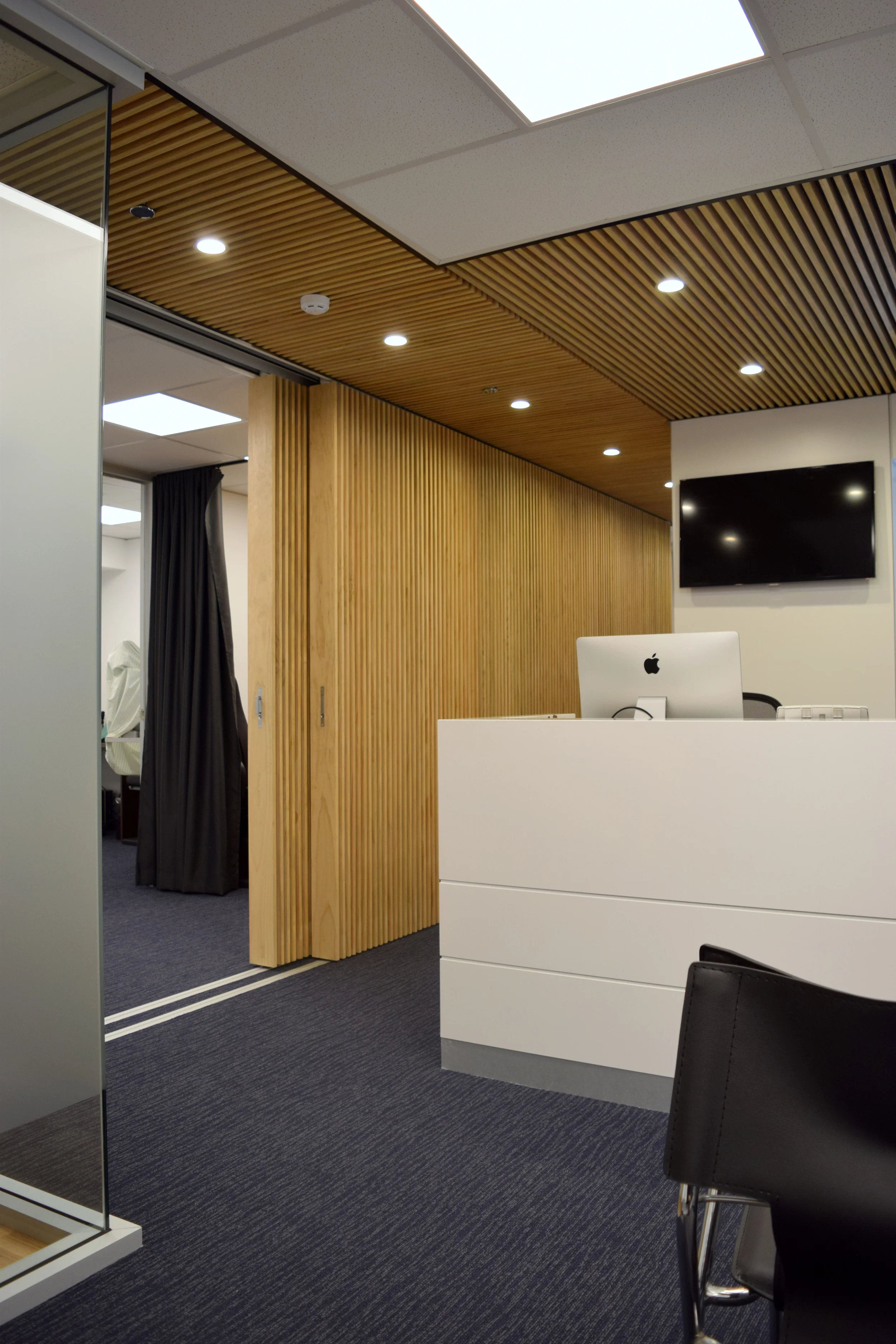 Timber wall panels slide open to a wide opening or whatever particular configuration is required allowing flexibility in use and access of spaces. 